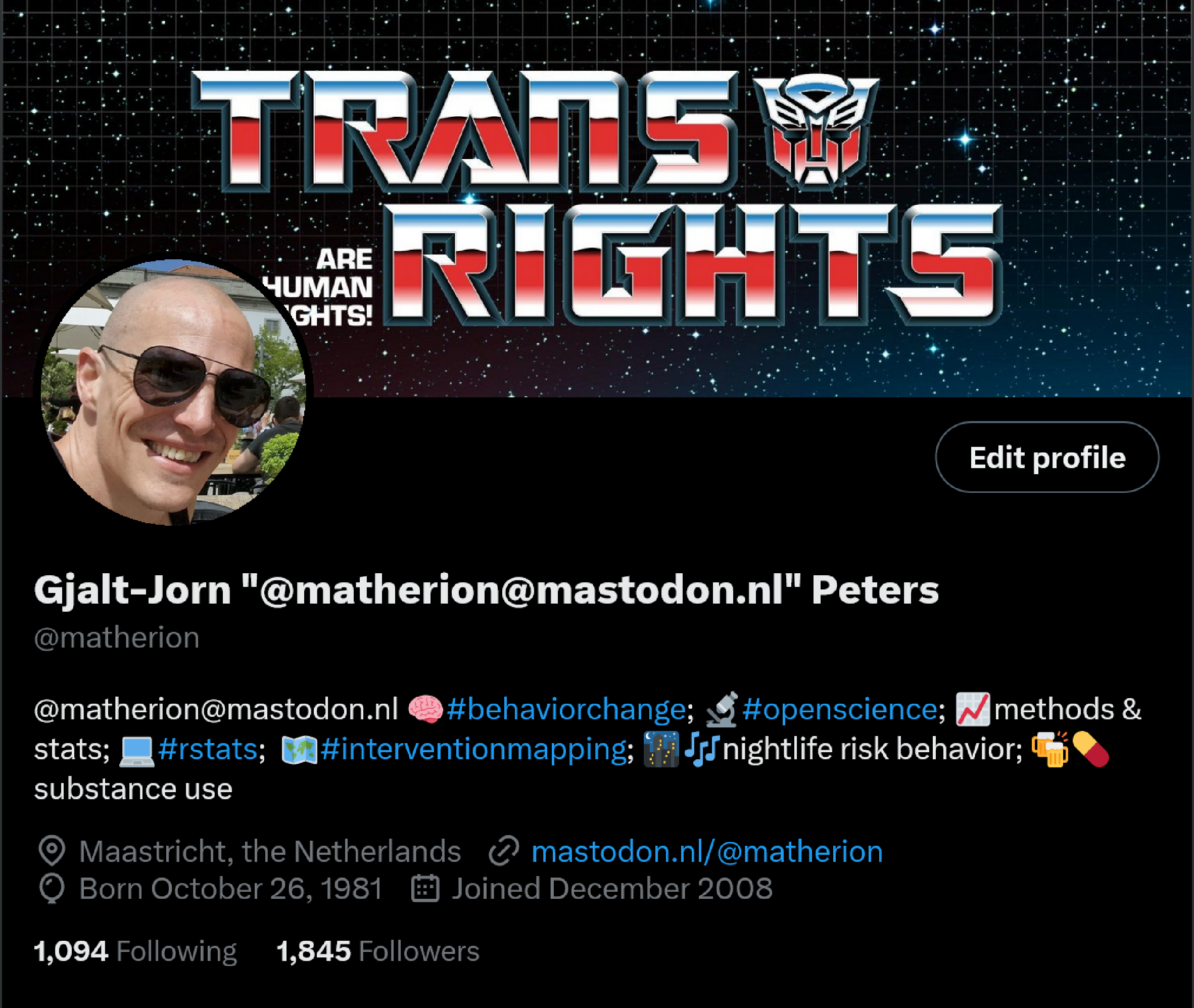 A screenshot of my old Twitter profile, with a cool banner saying 'Trans rights are human rights' by Kathryn Gibes.