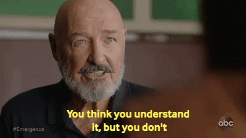 A GIF of a man saying 'you think you understand it, but you don't'